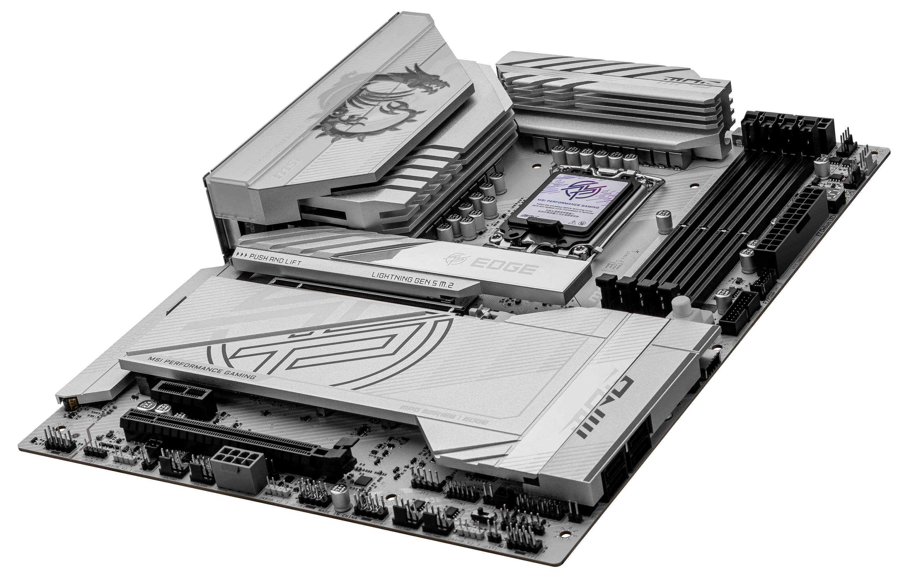 Une carte mère argentée avec un socket CPU, des emplacements mémoire et différents connecteurs. Design avec des motifs géométriques.