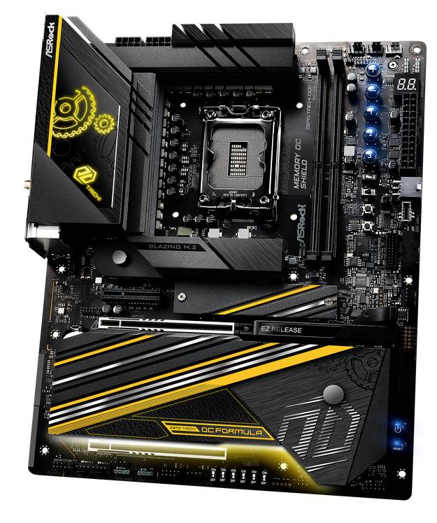 Carte mère ASRock noire avec des touches jaunes. Le socket CPU, les dissipateurs thermiques et plusieurs connecteurs sont visibles.