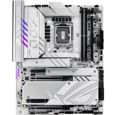 Carte mère d'ordinateur avec plusieurs connecteurs et emplacements, incluant des emplacements pour RAM et un socket pour processeur, avec des éléments de design argentés et violets.