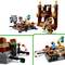 Ensemble LEGO avec plusieurs figurines, comprenant des chevaliers royaux et des monstres, dans un château de style Minecraft. Scènes de combat et de jeu.