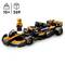Ensemble de voiture de course Lego avec figurine de pilote, noir et orange. Convient aux enfants à partir de 10 ans, contient 269 pièces.