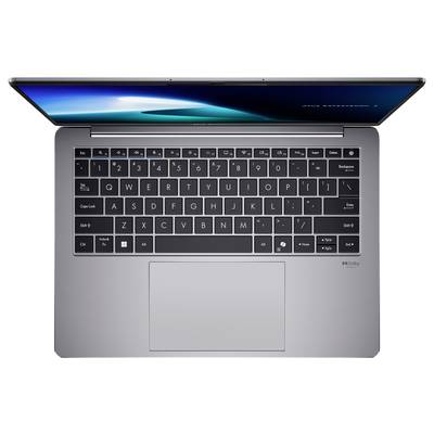 Ordinateur portable argenté vu de dessus, ouvert, montrant un clavier sur fond noir avec un pavé tactile. L'écran est allumé, mais n'affiche aucune image spécifique.