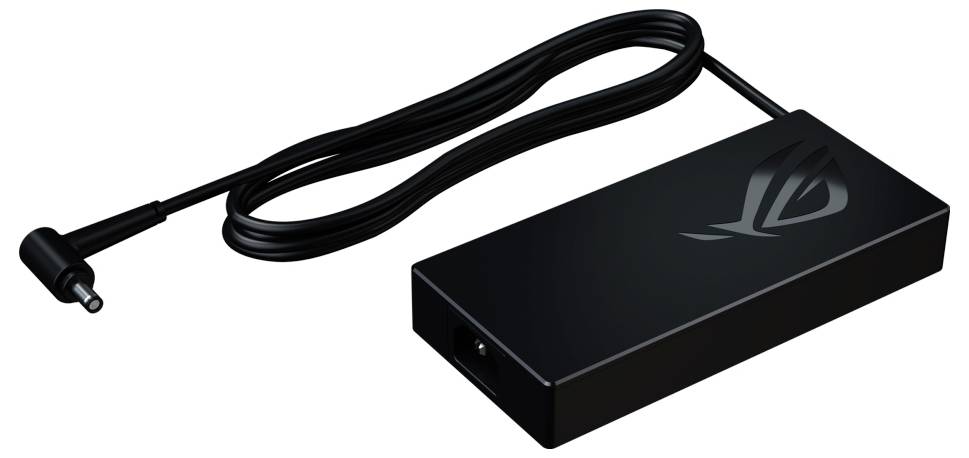 Bloc d'alimentation noir avec câble amovible, adapté aux ordinateurs portables de gaming, arborant le logo ROG sur le dessus du boîtier.