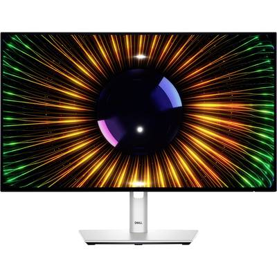 Un écran d'ordinateur affiche un motif coloré et pulsant avec des rayons lumineux en orange et en vert qui convergent vers le centre.