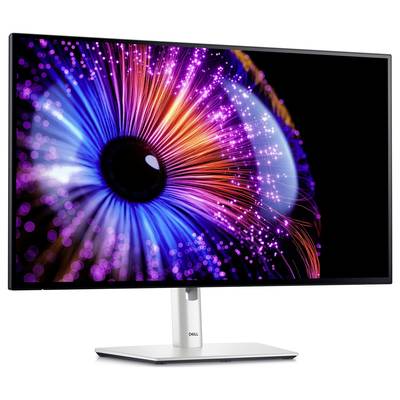 Un moniteur Dell affiche une image colorée avec un motif abstrait, semblable à un iris, composé de lignes lumineuses et de points.