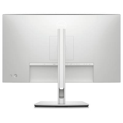 Vue arrière d'un écran d'ordinateur gris sur un socle, avec des ports et des boutons de commande visibles sur le bord inférieur.