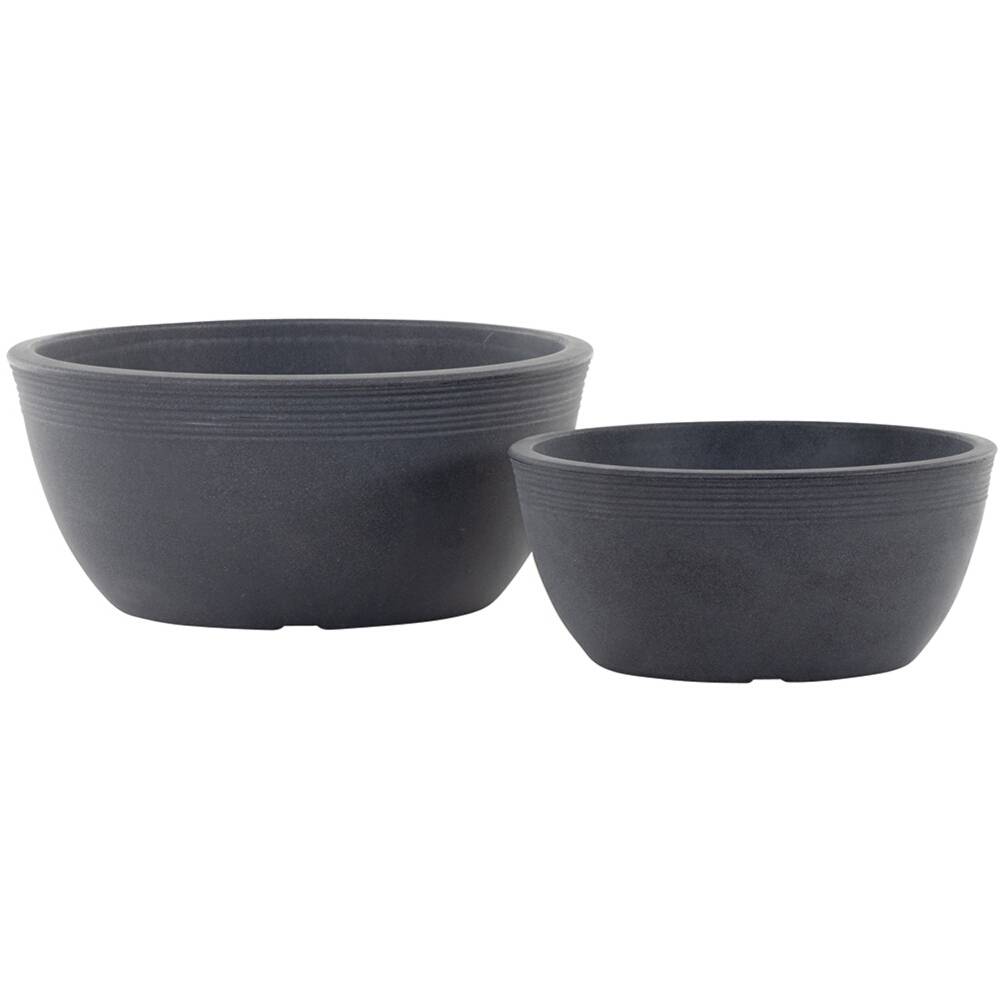 Deux bols gris de tailles différentes côte à côte.