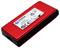 SSD portable rouge avec l'étiquette 'Kingston XS1000', capacité de stockage de 2 To, différents signes de certification.