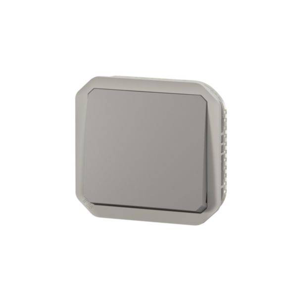 Un appareil gris, carré avec des coins arrondis et une surface lisse.