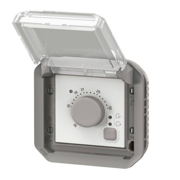 Un commutateur rotatif gris et blanc dans un boîtier avec un couvercle transparent indique des valeurs de température de 0 à 35 degrés Celsius.