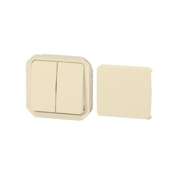 Un cache d'interrupteur beige à double compartiment, placé à côté d'un cache assorti, tous deux avec des coins arrondis.