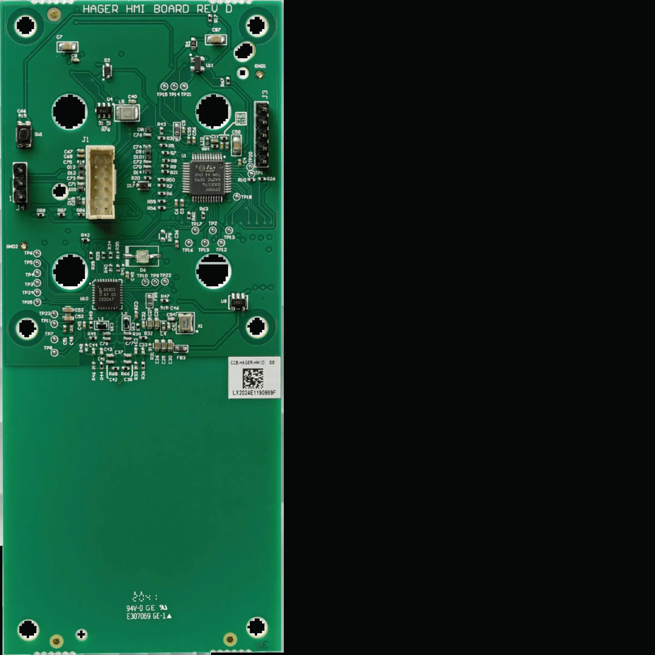 Circuit électronique vert avec différents circuits intégrés, résistances et condensateurs à sa surface.