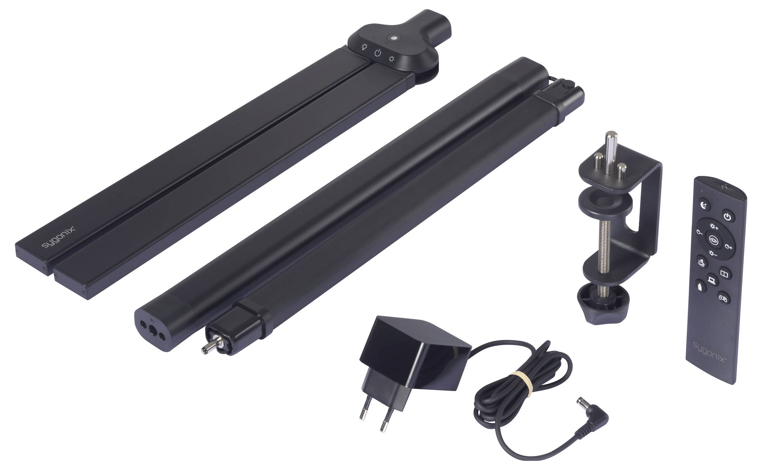 Lampe LED noire pliable avec pince, télécommande, adaptateur secteur et câble. Convient pour bureaux ou postes de travail.