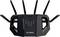 Routeur à six antennes, marqué 'TUF Gaming'.