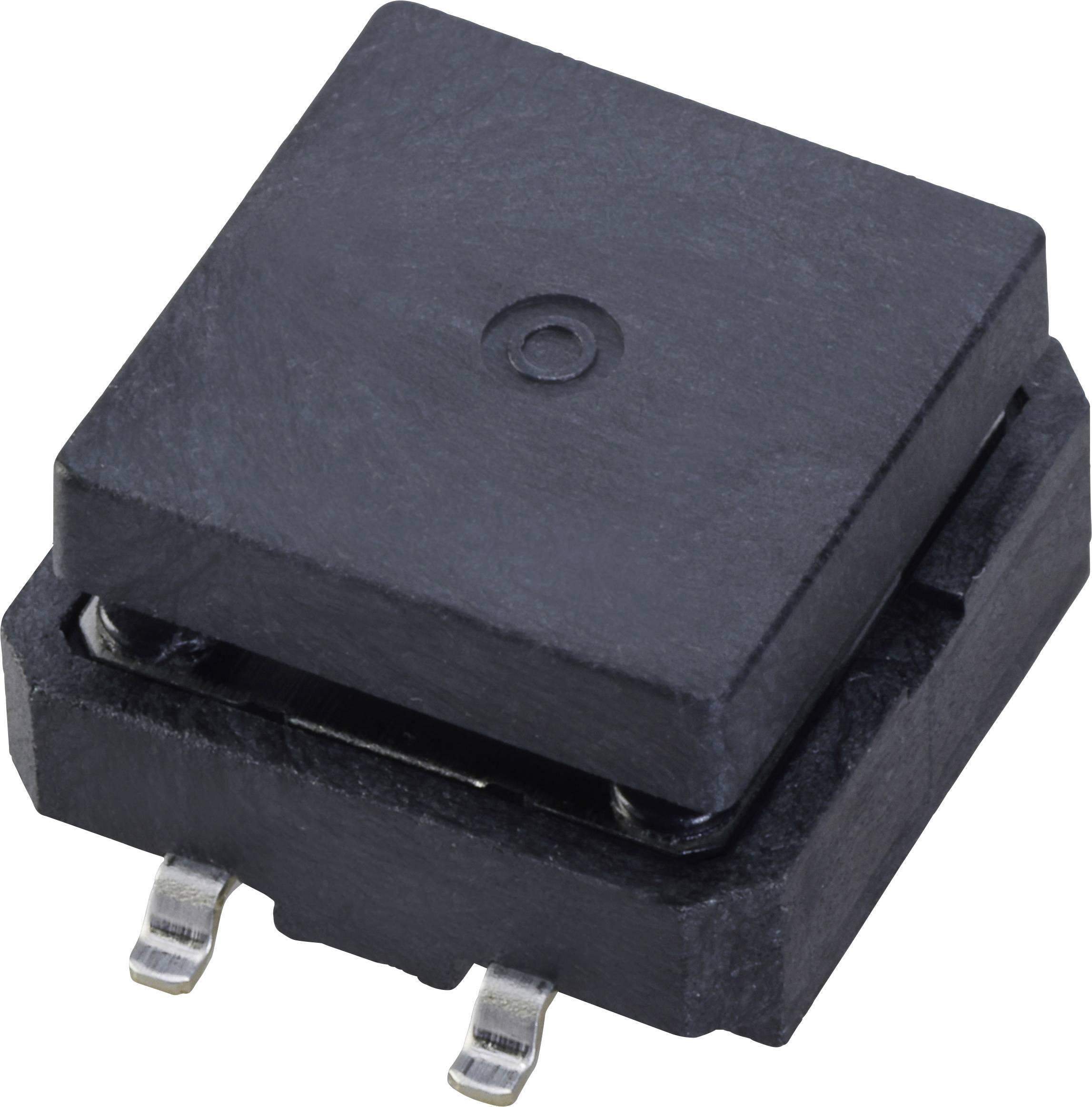 Composant électronique noir de forme carrée avec deux connexions métalliques à sa base, posé sur une surface claire.