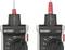Deux testeurs de tension Voltcraft VC311 avec sondes rouges et réglages de mesure, mettant l'accent sur les fonctions Hz et NCV (détection de tension sans contact).