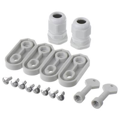 Passages de câbles en plastique blanc, vis, joints et clés pour montages.