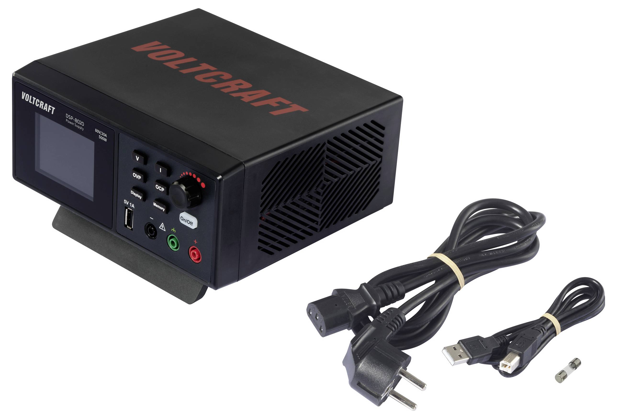 Un bloc d'alimentation de VOLTCRAFT avec un affichage numérique, accompagné de deux câbles de fixation et de fiches qui sont posés à côté.