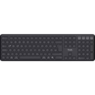 Clavier d'ordinateur noir sans fil, avec des touches arrondies et le logo 'Trust' au centre.