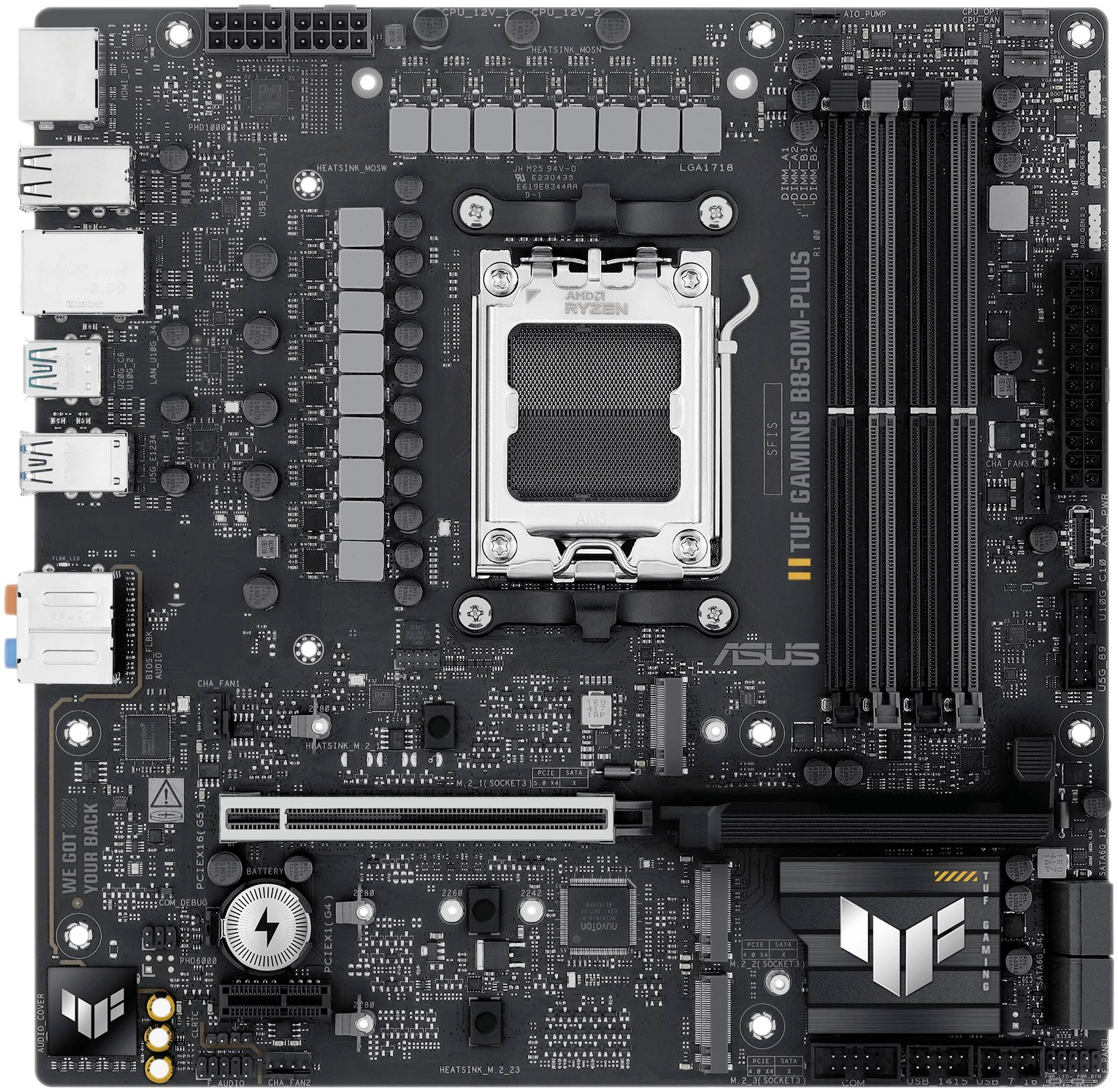 Une carte mère ASUS TUF Gaming B550M-Plus noire avec plusieurs connecteurs, des emplacements pour RAM et un socket CPU au centre.