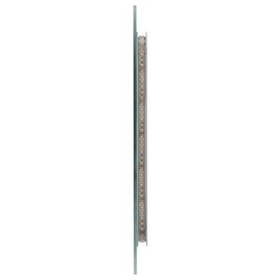 Gros plan d'un tube de verre avec des marquages colorés et une échelle, probablement un instrument de mesure, maintenu entre deux supports métalliques.