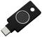 Une clé de sécurité USB-C noire avec un capteur tactile circulaire, utilisée pour l'authentification à deux facteurs.
