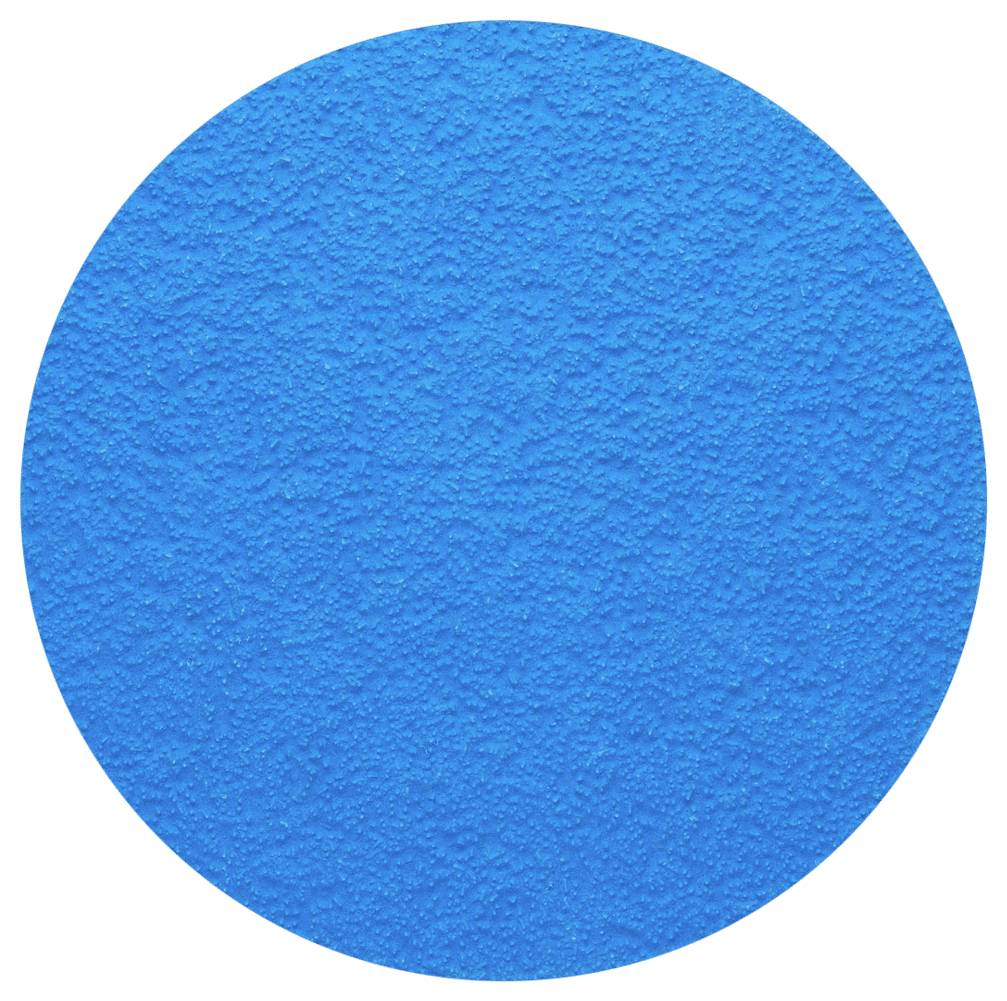 Une surface ronde d'un bleu vibrant avec une texture rugueuse et structurée.