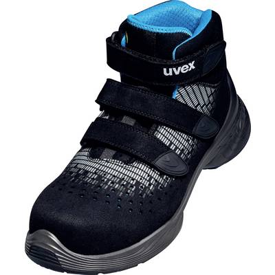 Chaussure de sécurité noire avec fermetures à scratch, doublure intérieure bleue et matériau supérieur perforé pour une meilleure respirabilité.