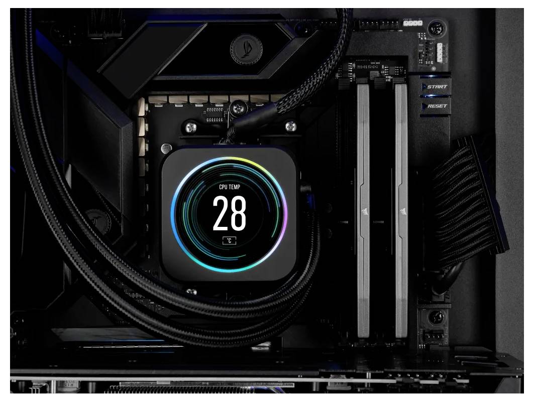 Système de refroidissement dans le boîtier d'ordinateur affiche une température de CPU de 28 degrés Celsius sur un écran numérique.
