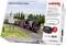 Pack de démarrage numérique pour chemin de fer, comprenant une locomotive et un modèle de paysage, étiqueté 'Démarrer avec Märklin Digital'.