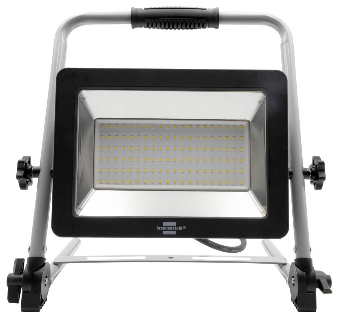 Un projecteur de chantier portable à LED avec un cadre argenté et un contour noir. De nombreuses petites LED sur une surface claire, adapté à l'éclairage de chantier.