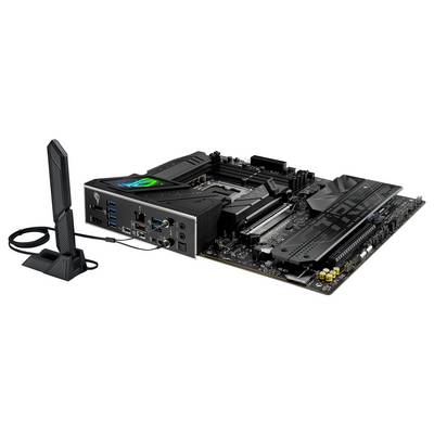 Carte mère ASUS ROG Strix Z690-E Gaming WiFi 6E avec plusieurs ports, emplacements d'extension, une antenne et un logo éclairé sur la carte.