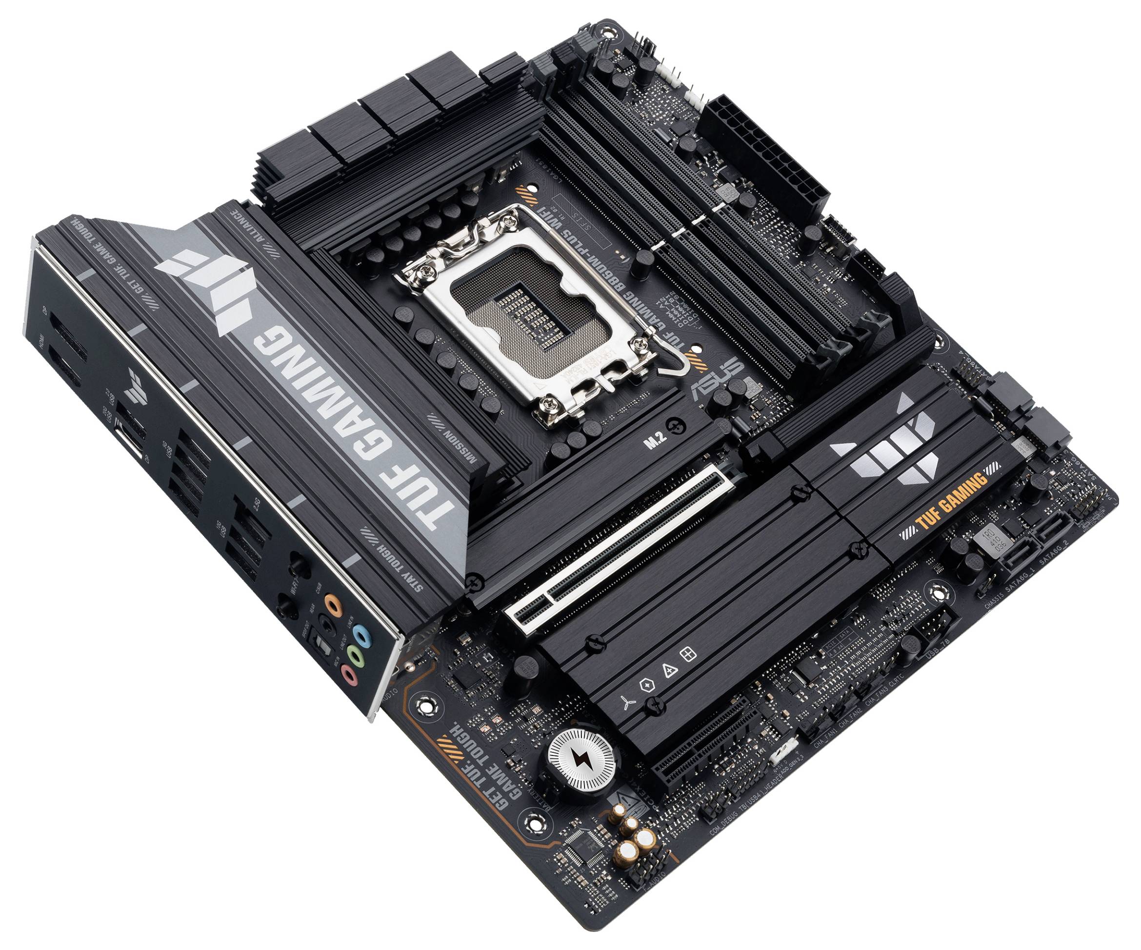 Une carte mère de gaming noire avec plusieurs emplacements pour RAM, un socket processeur et des ports de connectivité, arborant la marque « TUF GAMING ».