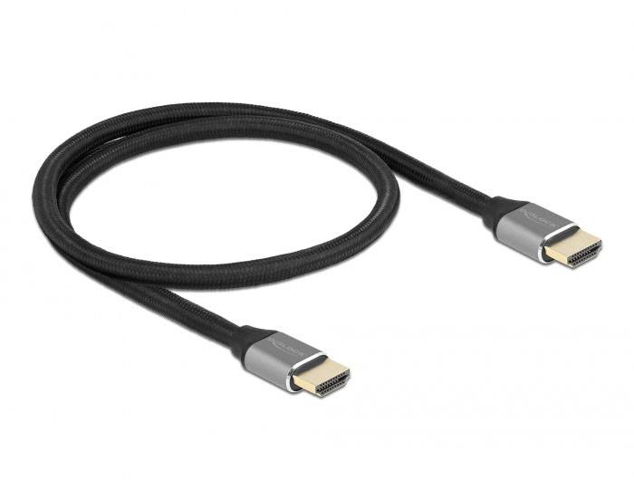 Un câble HDMI noir avec des connecteurs métalliques, adapté pour connecter des appareils audio et vidéo.