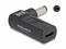 Un adaptateur rectangulaire de Delock avec une connexion USB-C d'un côté et une fiche ronde de l'autre.