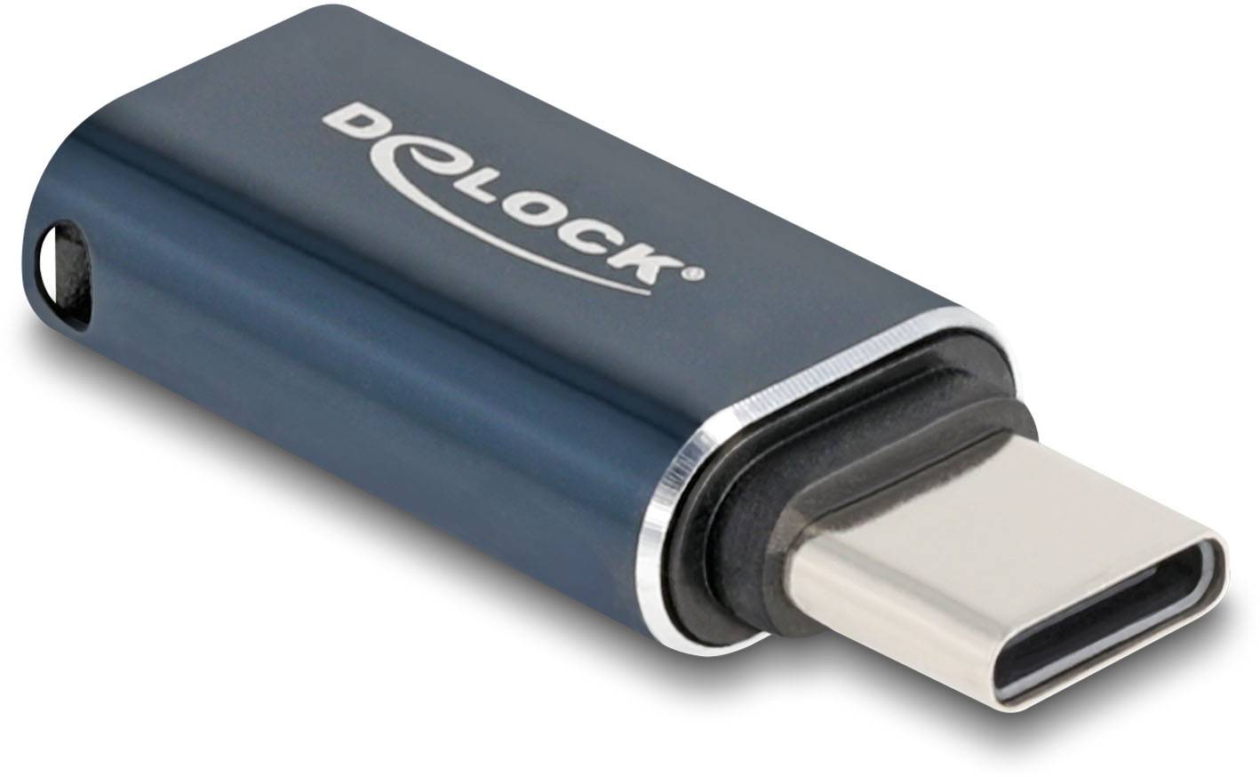 Adaptateur USB-C de Delock, noir avec bordure argentée, pour des connexions dans un contexte technologique.