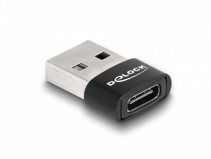 Un adaptateur USB avec boîtier noir, qui convertit une connexion USB-A en connecteur USB-C.