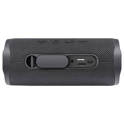 Un haut-parleur portable avec boîtier en caoutchouc, des touches visibles pour le volume et la lecture, ainsi que des ports USB et AUX.