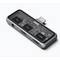 Un hub USB-C portable à trois ports : une prise casque, un port USB et un port HDMI. Le boîtier est transparent et révèle le circuit interne.