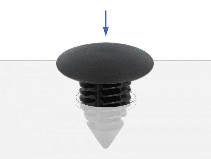 Un bouchon noir, rond, avec une flèche pointant vers le bas, indique l'installation ou la fixation dans une surface.