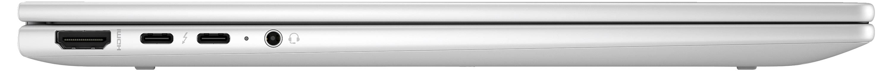 Ordinateur portable argenté fermé vu de côté, avec ses ports visibles : HDMI, deux ports USB-C et une prise casque.