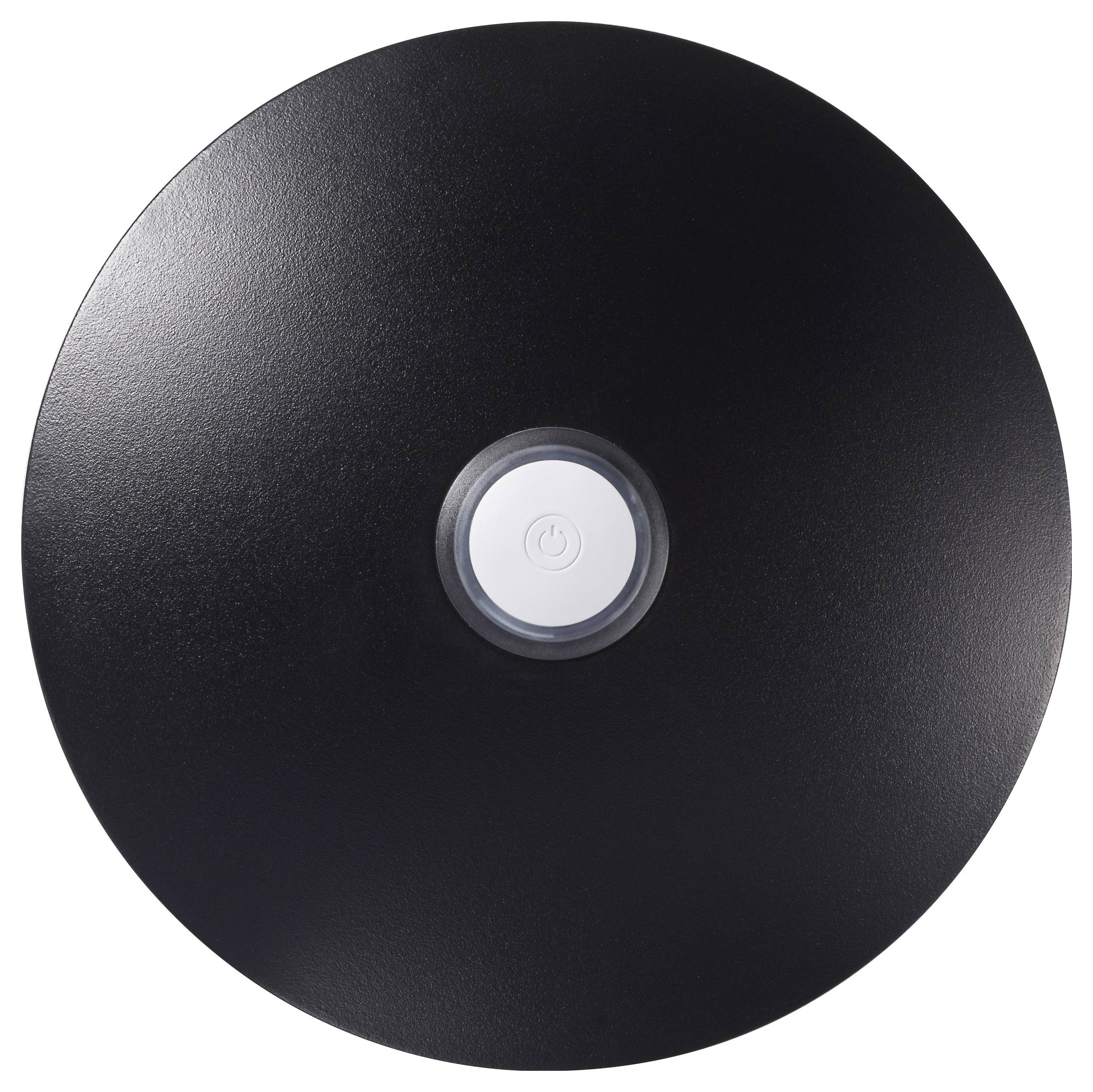 Un objet circulaire noir avec un bouton d'alimentation blanc au centre.