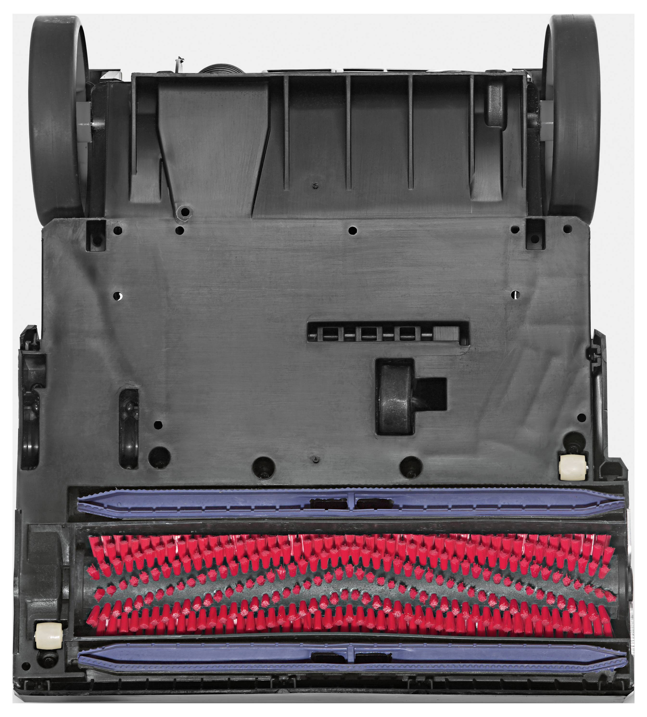 Le dessous d'un robot aspirateur avec des rouleaux de brosses rouges et des roues noires, adapté pour le nettoyage des sols durs et des tapis.