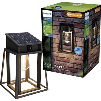 Lampe murale d'extérieur Philips alimentée par énergie solaire en noir et or, présentée à côté de son emballage produit avec le texte « 500 lumens » et « jusqu'à 4 nuits d'éclairage avec une seule charge ».