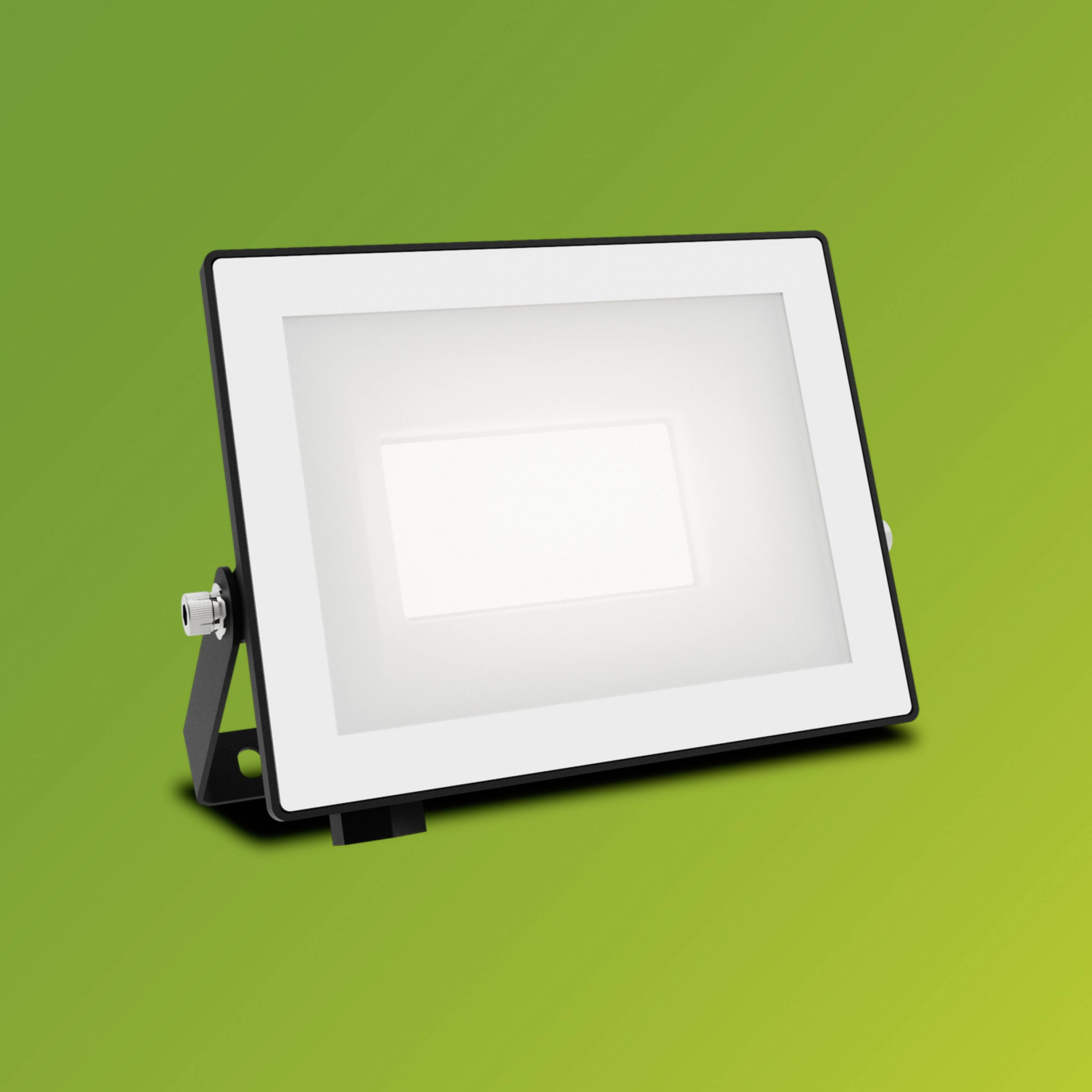 Projecteur extérieur avec boîtier rectangulaire blanc sur un fond vert. Design épuré, adapté à l'éclairage de jardin ou de cour.
