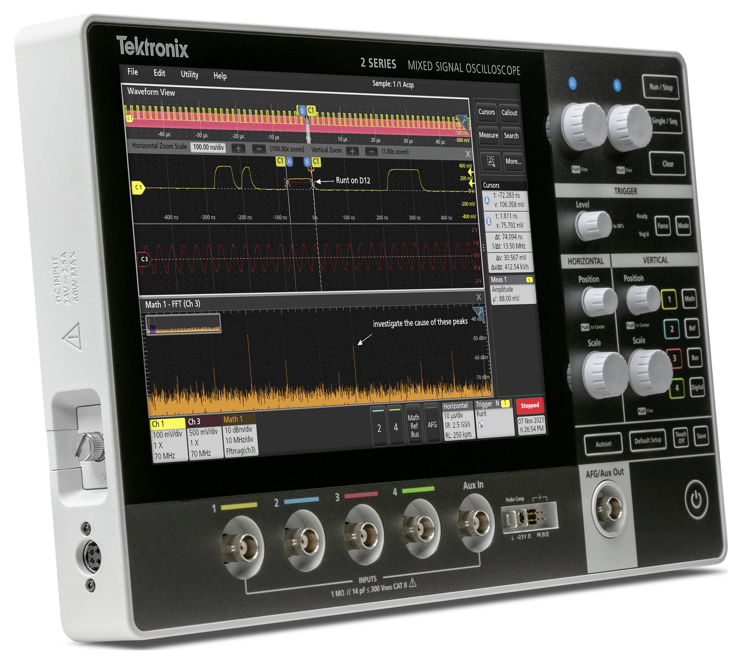 Oscilloscope numérique à affichage multicolore montrant deux formes d'ondes et des diagrammes ; boutons de commande et connexions sur le côté.