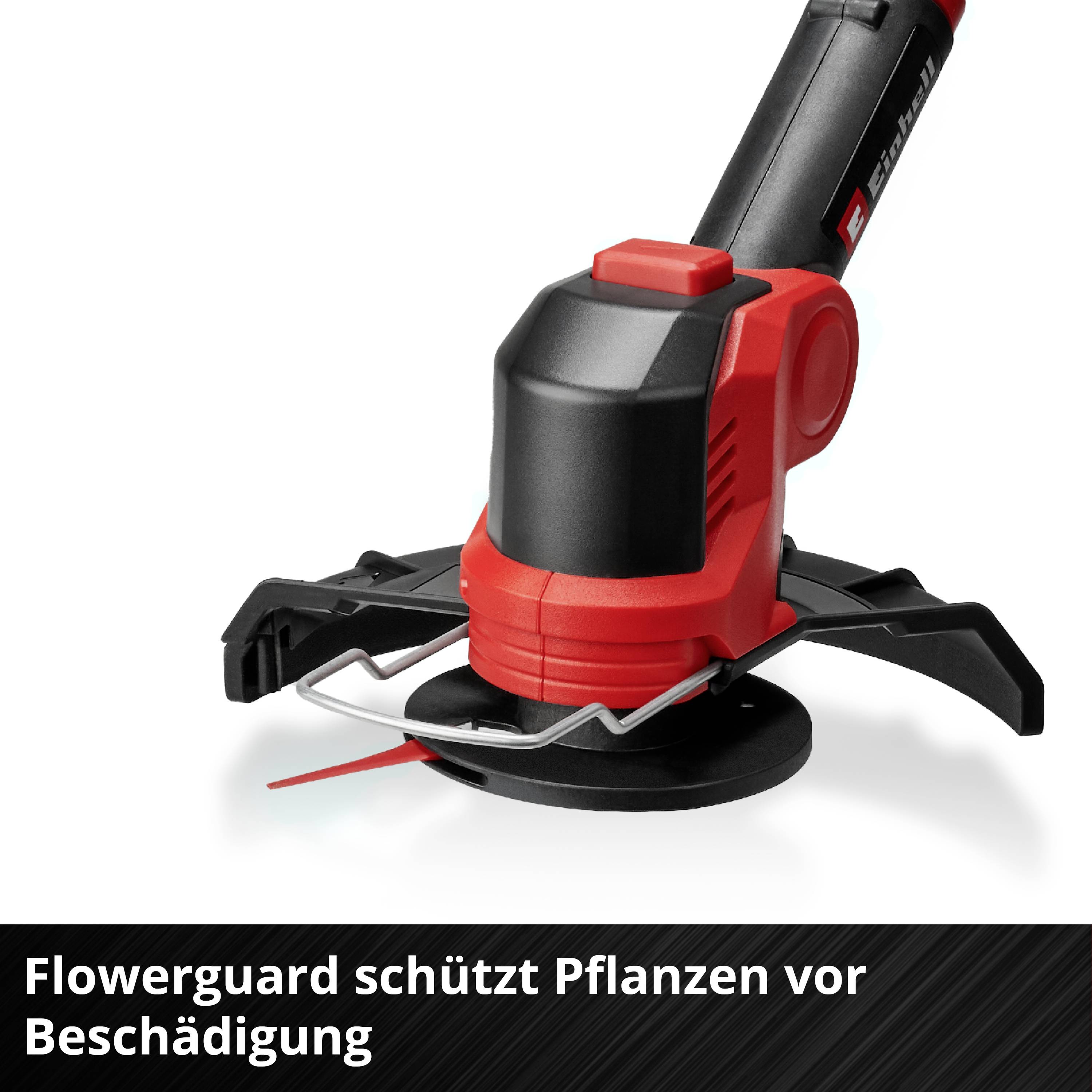 Un coupe-bordures électrique avec dispositif de protection des plantes. Texte dans l'image : 'Flowerguard protège les plantes contre les dommages'.
