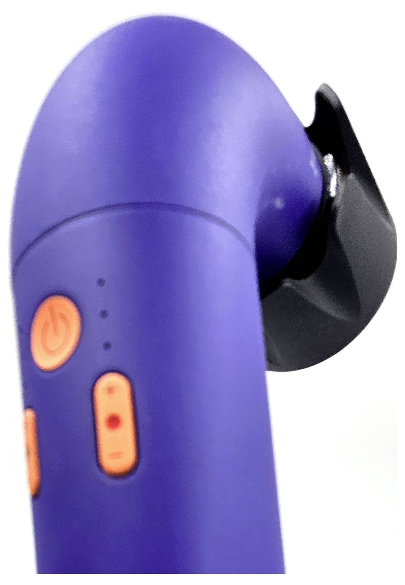 Lila, appareil électronique incurvé avec des touches orange et un support noir.