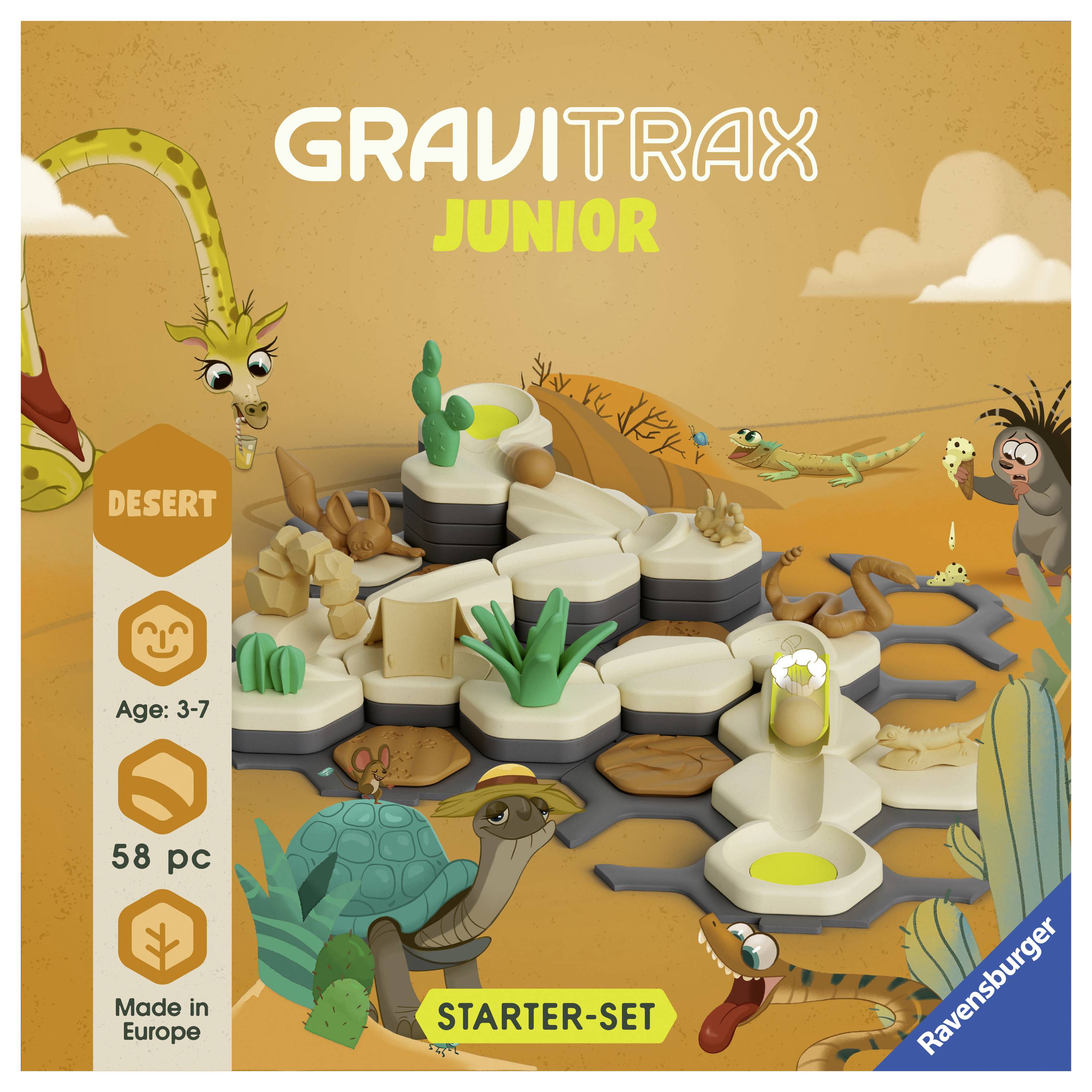 Un paysage désertique avec des animaux entoure un ensemble de jeu de la série GraviTrax Junior de Ravensburger, adapté aux enfants de 3 à 7 ans.