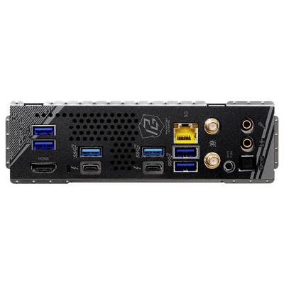 Vue arrière d'une carte mère d'ordinateur avec différents ports, notamment des ports USB, HDMI, Ethernet, des sorties audio et des connecteurs d'antenne.